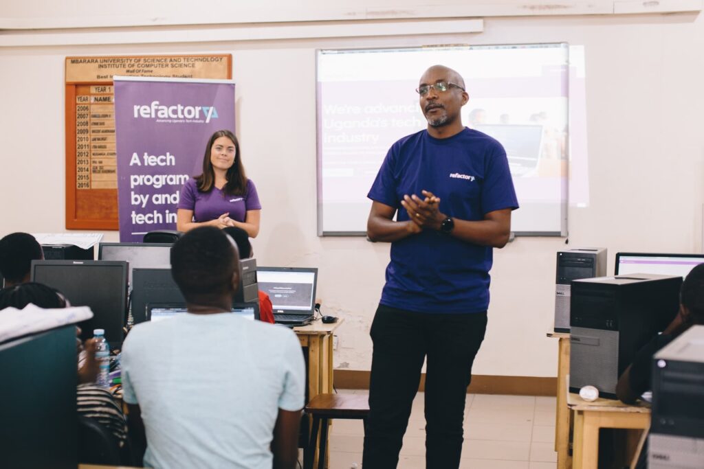 Michael Niyitegeka – Program Director Refactory speaking to workshop participants in Mbarara